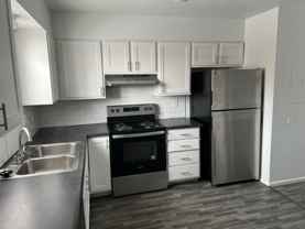 Beautifully updated townhouse, air conditioner, washer and dryer hookups, carport - Photo 1 of 1