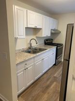 Nichols Manor Apartments (fka: Gaslight Square Apartments) - Photo 1 of 1