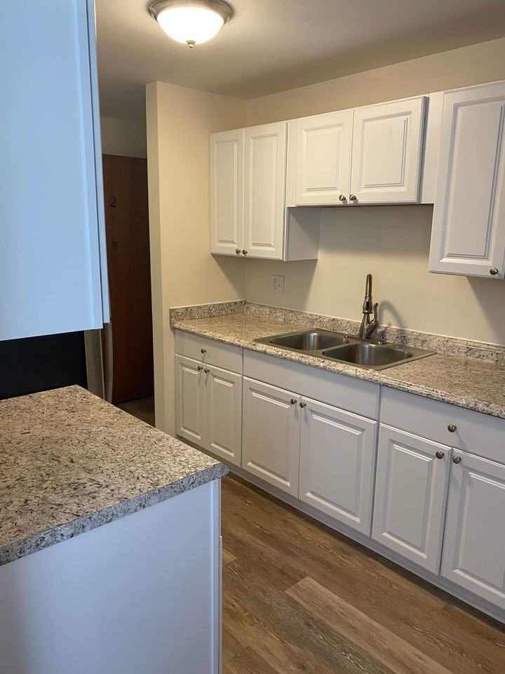 Nichols Manor Apartments (fka: Gaslight Square Apartments) - Photo 2 of 28