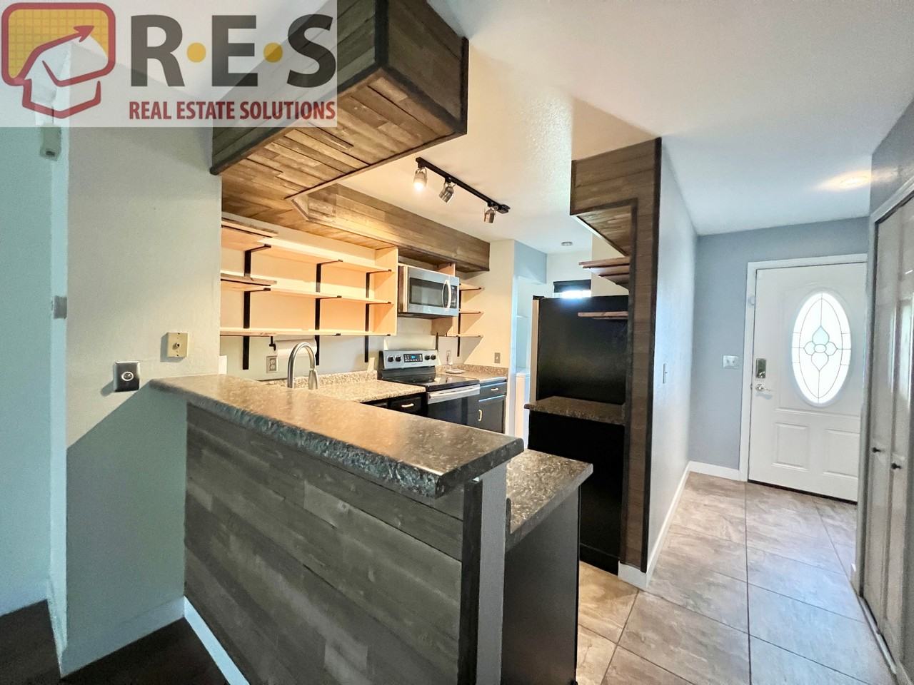 10104 W Dartmouth Ave - Photo 3 of 12