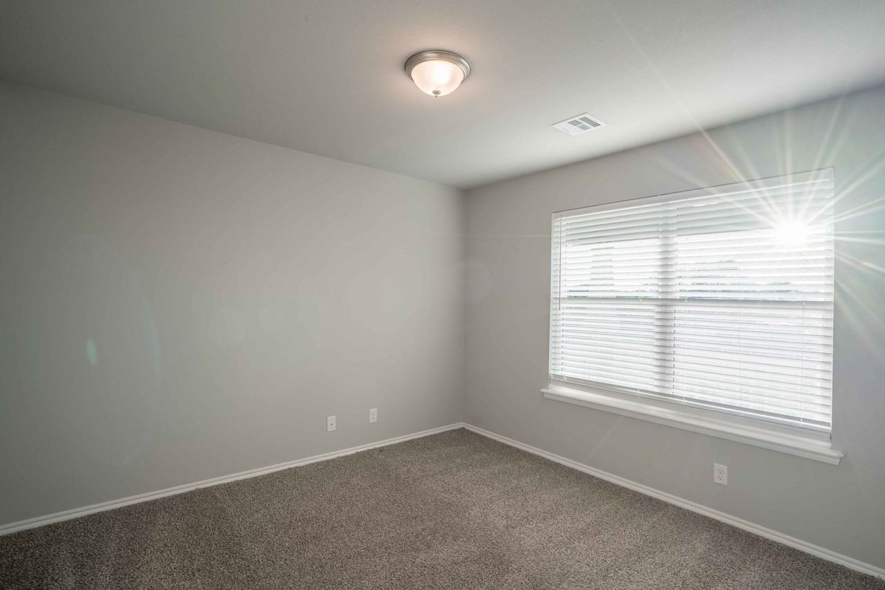 12505 N 130th East Ave - Photo 3 of 17