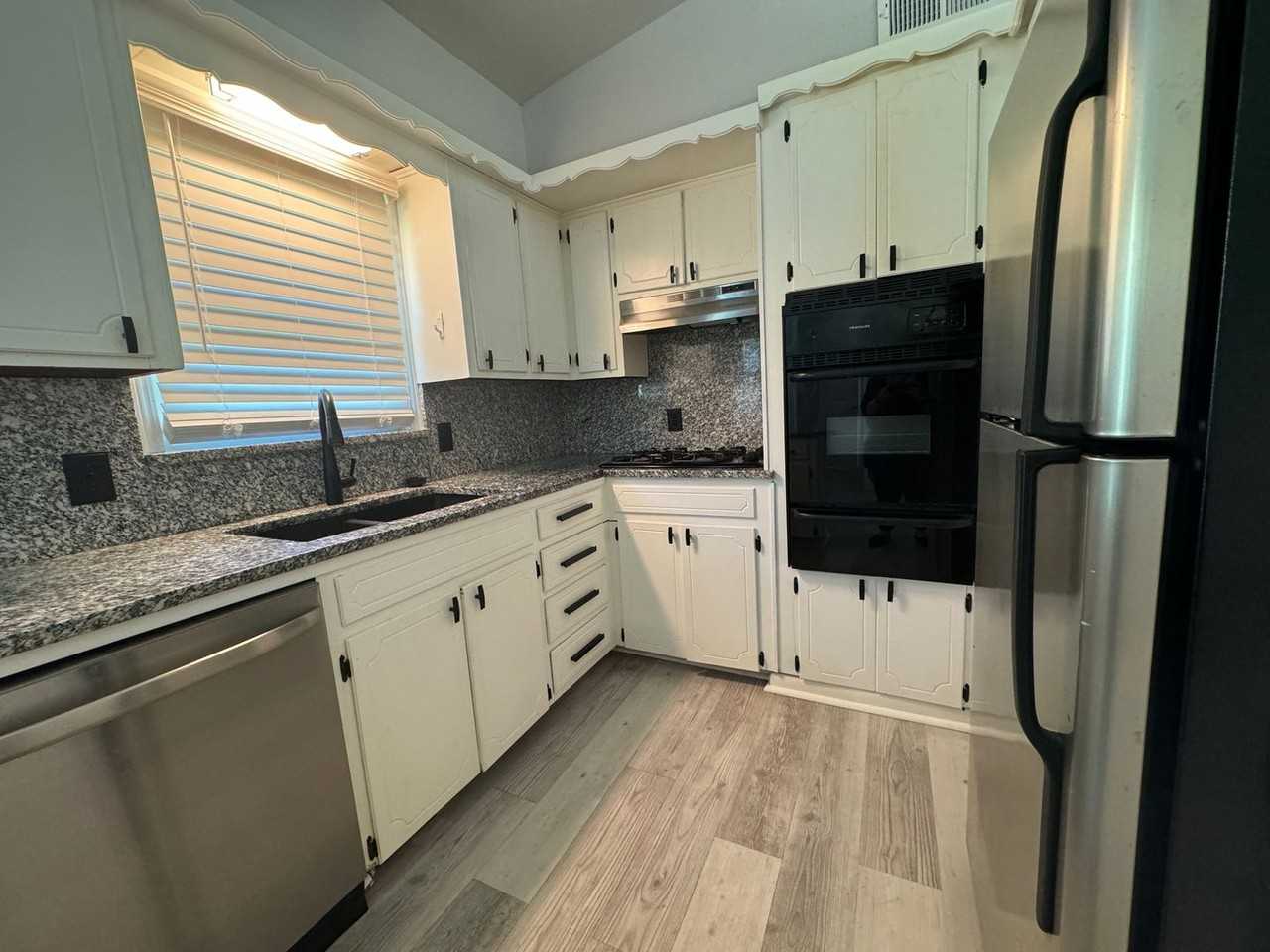 627 E 54th Pl N - Photo 7 of 23