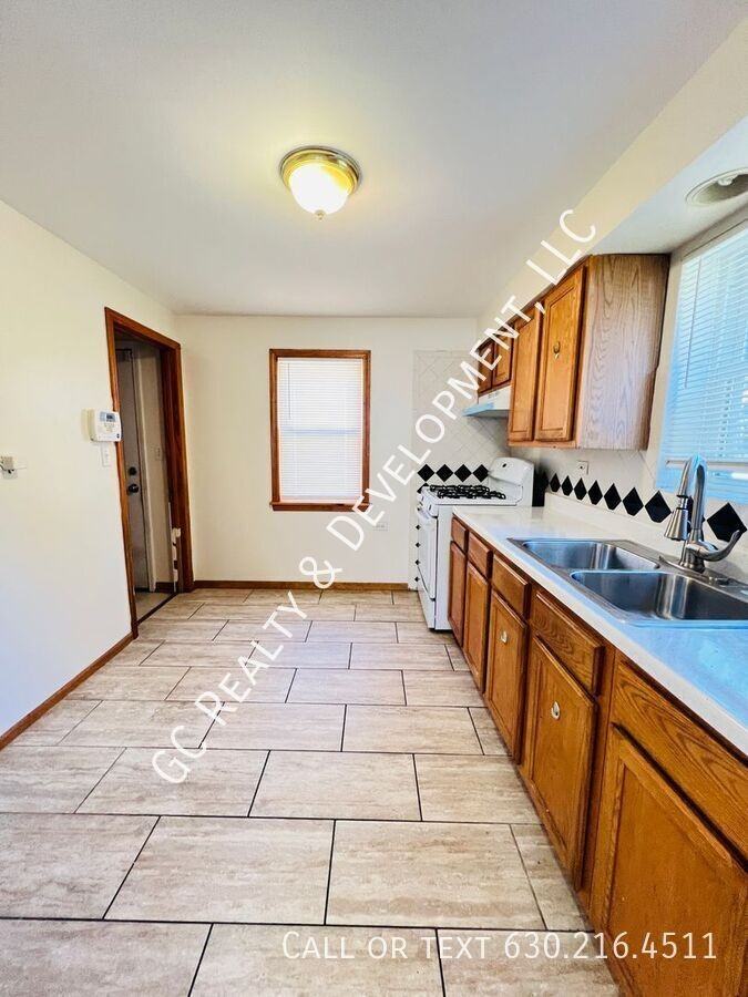 12870 S Green St - Photo 2 of 19