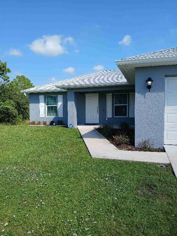 871 Grant Blvd, Lehigh Acres, FL 33974 - 3 bedroom House Rental 