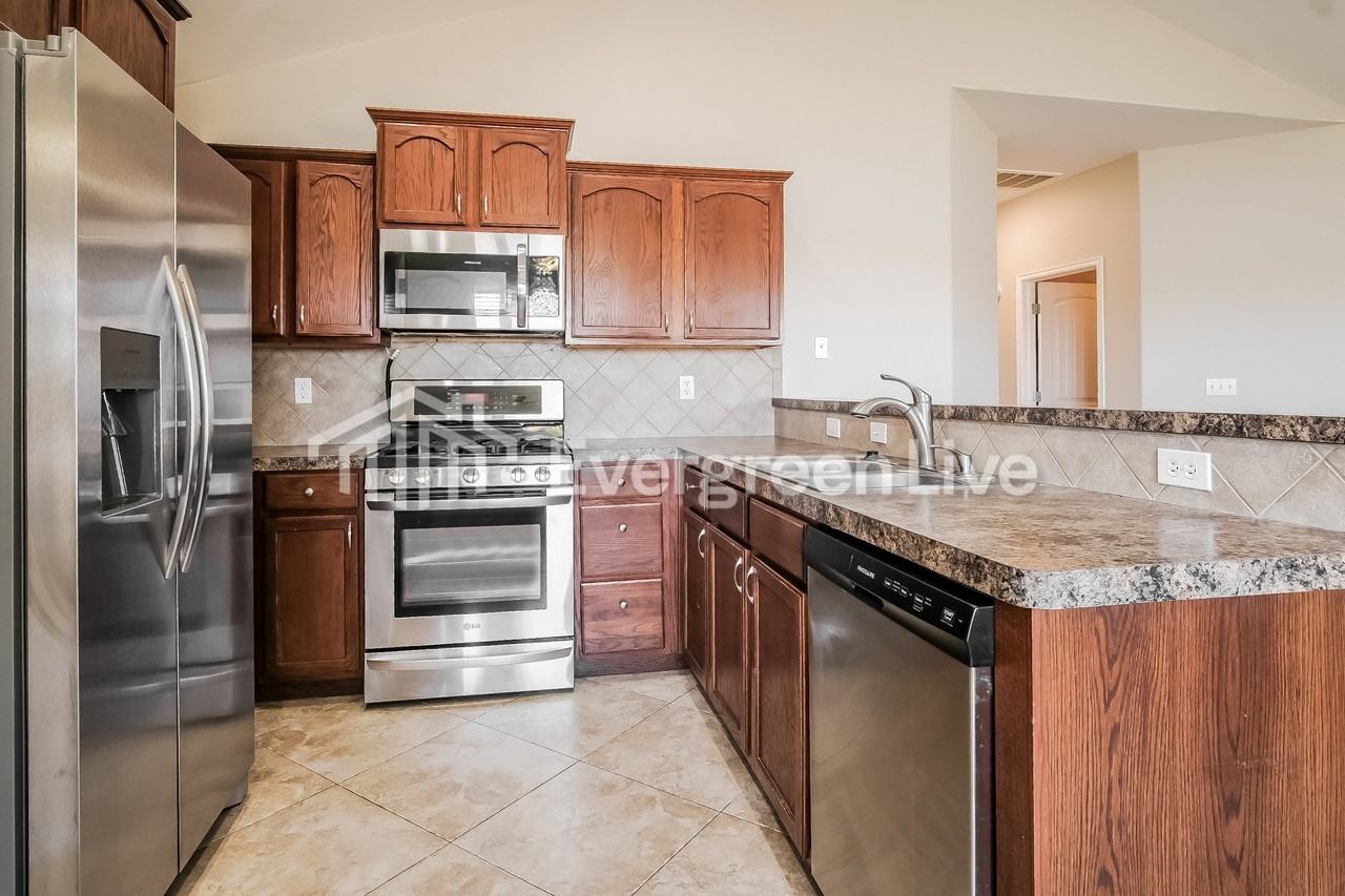 11009 N 146th East Ave - Photo 5 of 16