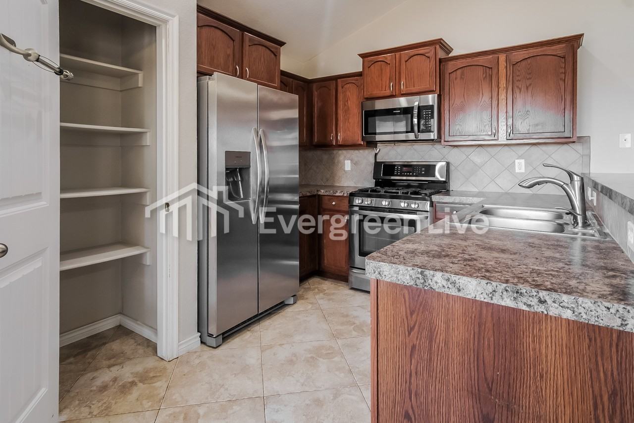 11009 N 146th East Ave - Photo 6 of 16