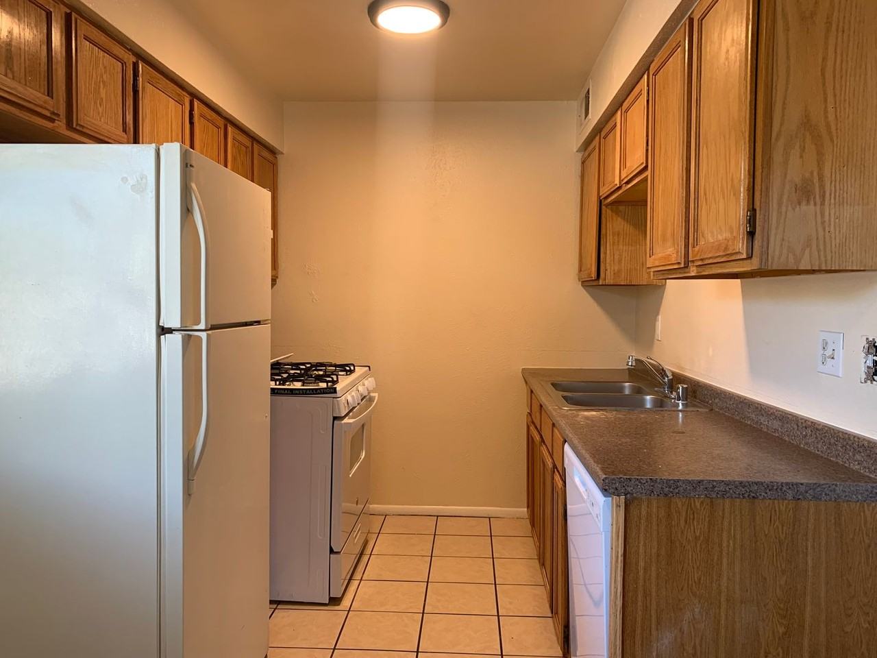 Adorable Fourplex Nestled in Four Hills - Photo 3 of 12