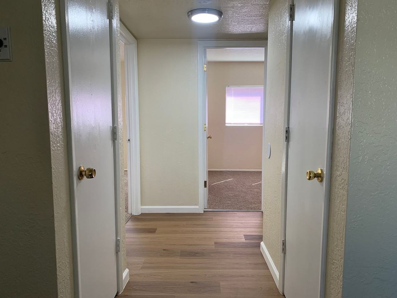 Adorable Fourplex Nestled in Four Hills - Photo 5 of 12