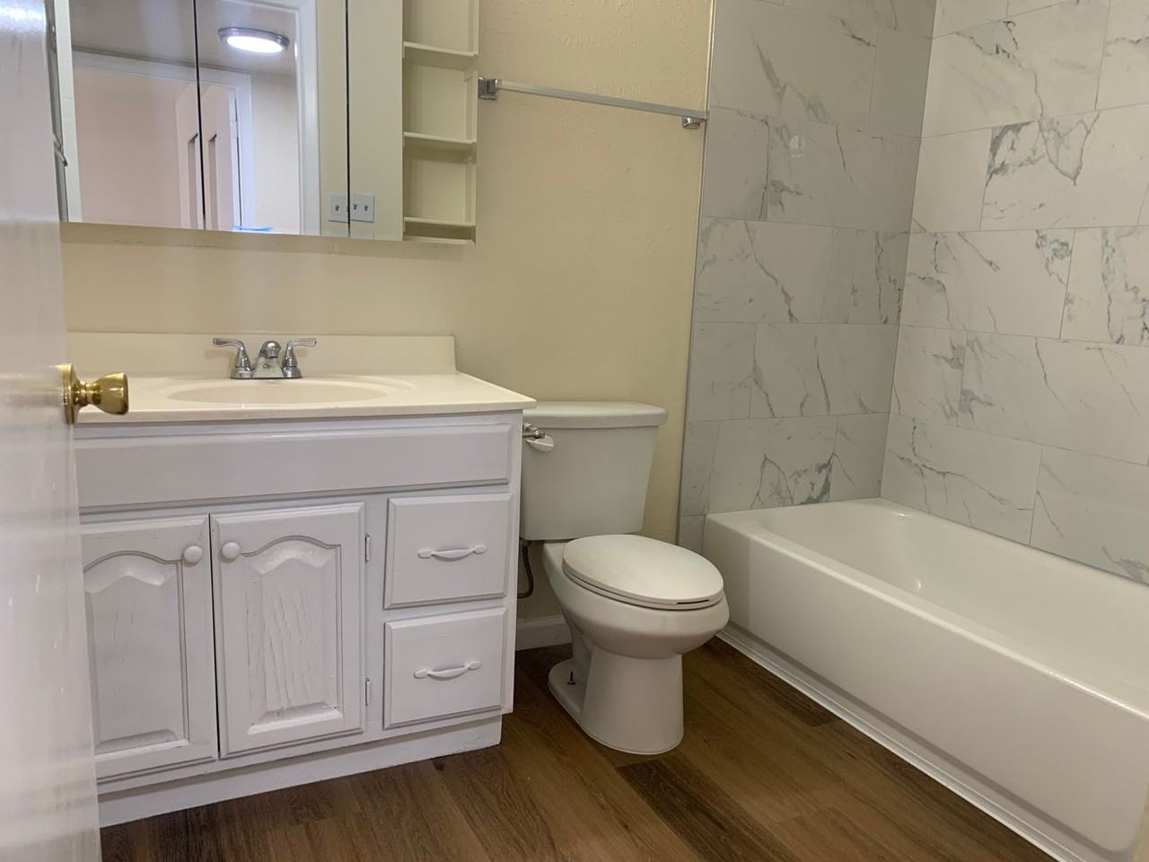 Adorable Fourplex Nestled in Four Hills - Photo 6 of 12