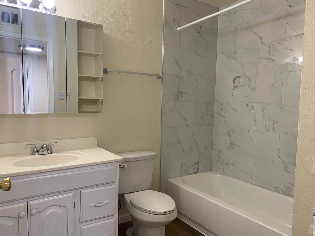 Adorable Fourplex Nestled in Four Hills - Photo 7 of 12