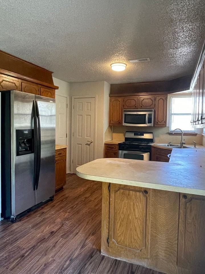 13645 South 287th East Avenue - Photo 3 of 12