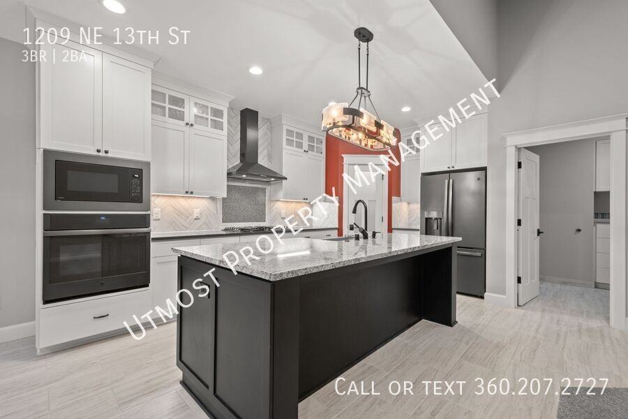 1209 Ne 13th St - Photo 3 of 14