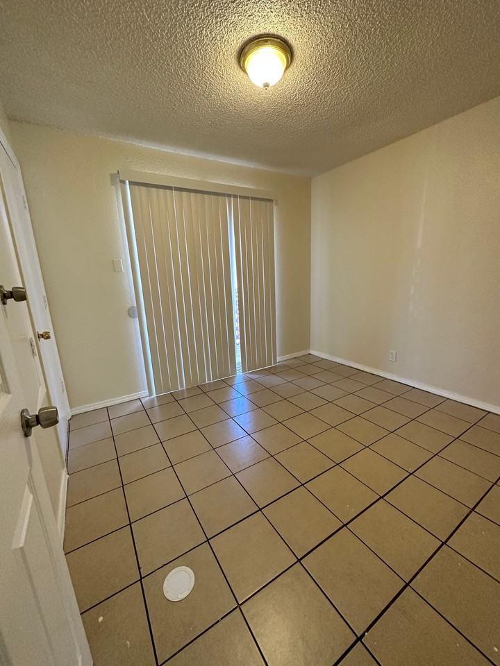 Spacious 2 Bedroom Apartment with Private Backyard - Photo 7 of 13