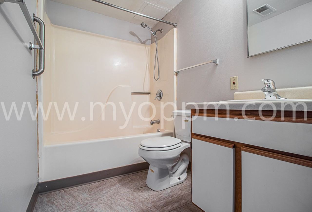 BEN APARTMENTS - Photo 6 of 9