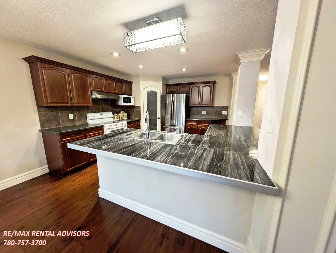 7363 Singer Way Nw - Photo 2 of 28