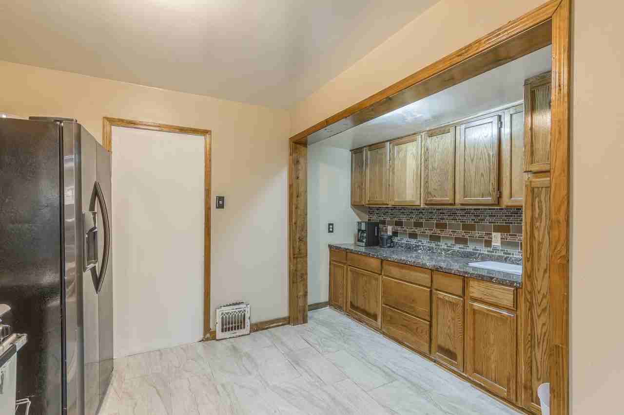 E 80th St - Photo 6 of 8