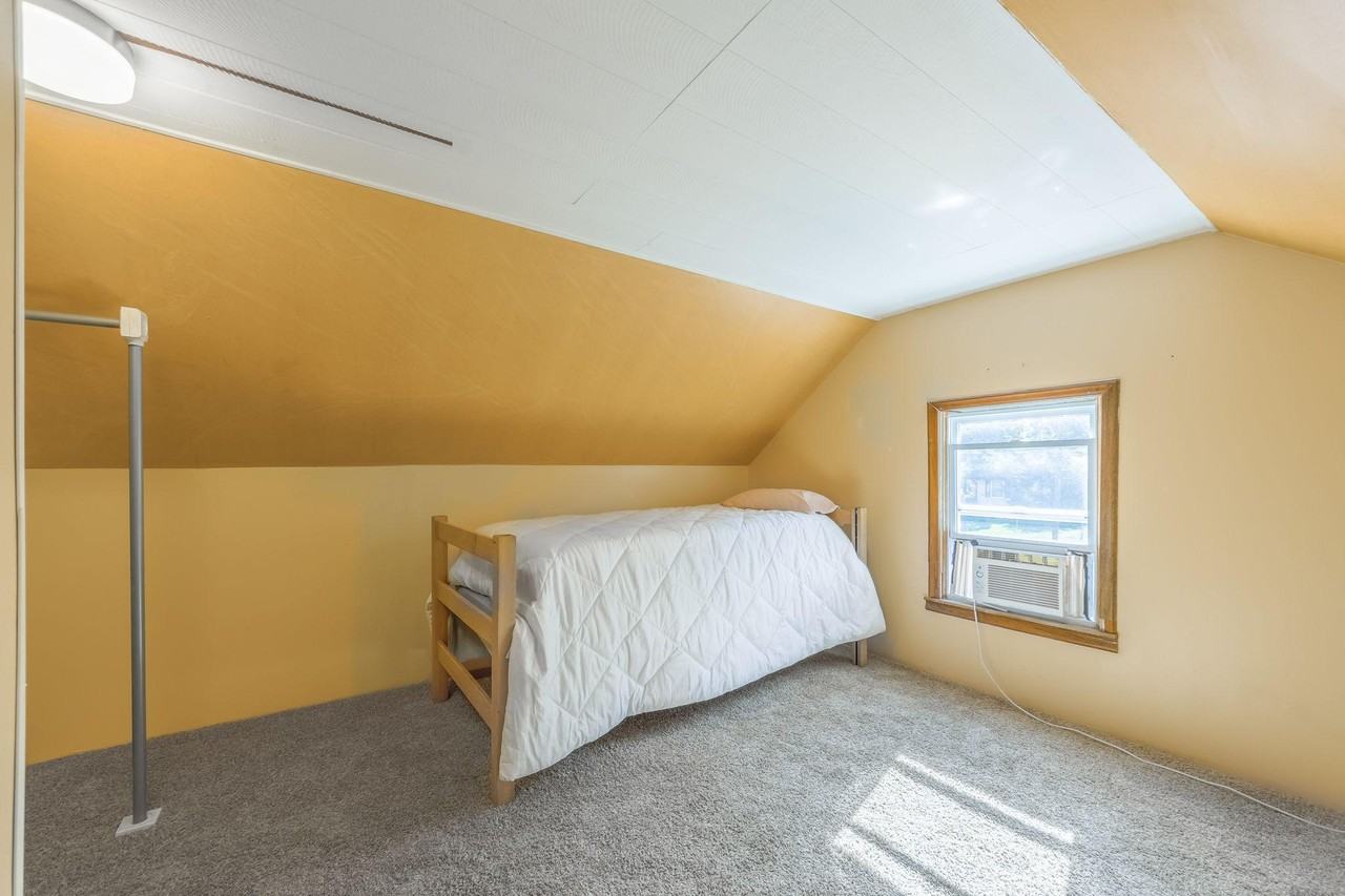 E 80th St - Photo 7 of 8