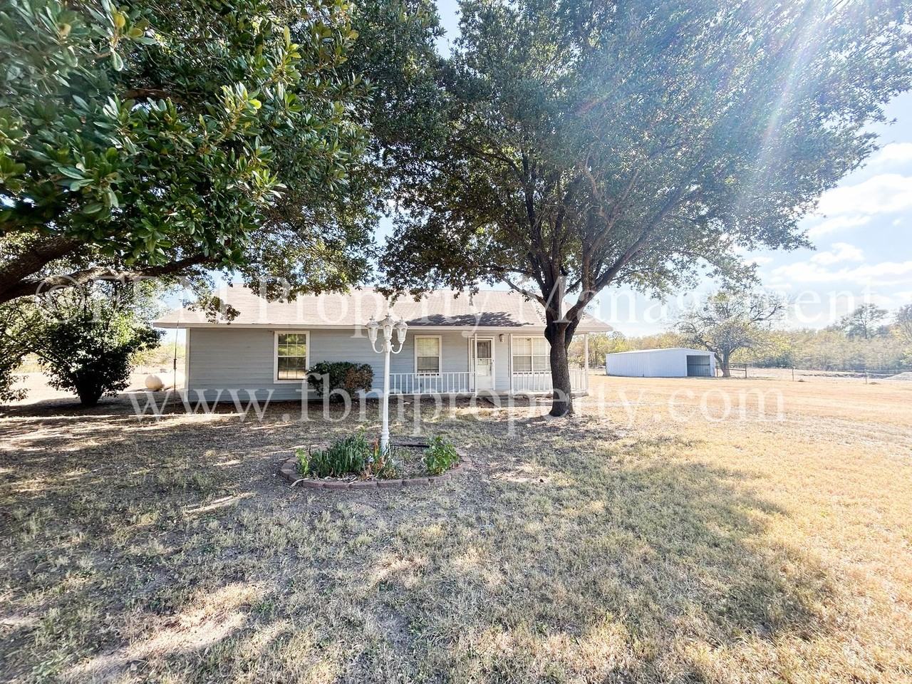 9008 Ne County Road 2140 - Photo 3 of 24