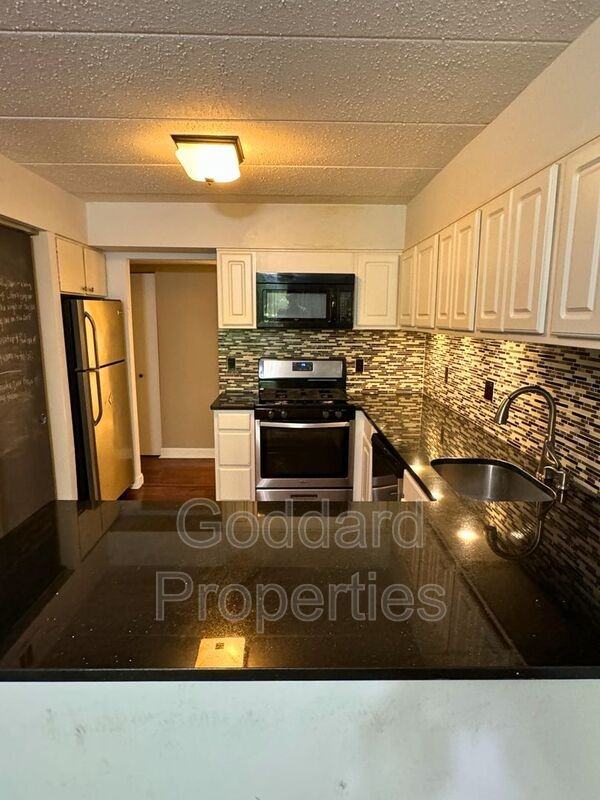 5657 Harpers Farm Rd #D - Photo 2 of 17