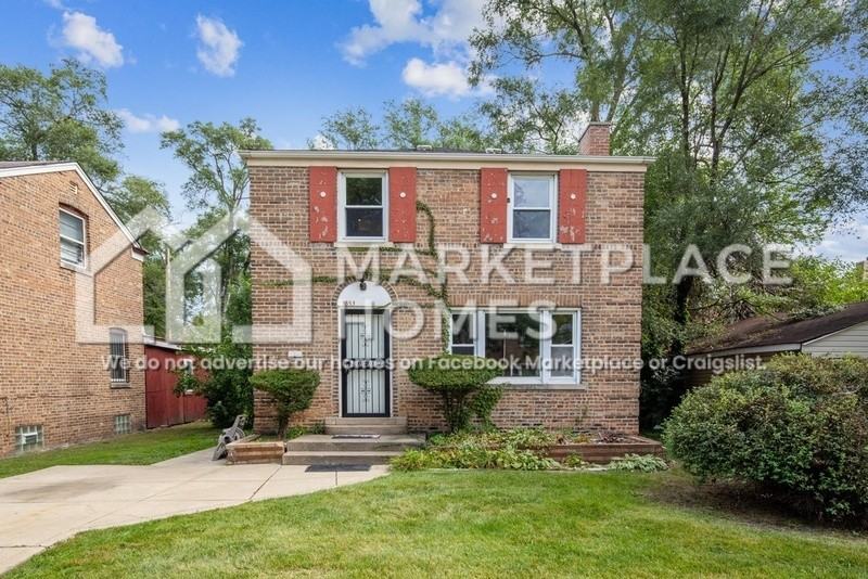 9853 S Bensley Ave - Photo 2 of 33