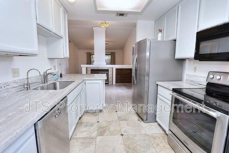 7400 Deltawind Dr - Photo 4 of 50