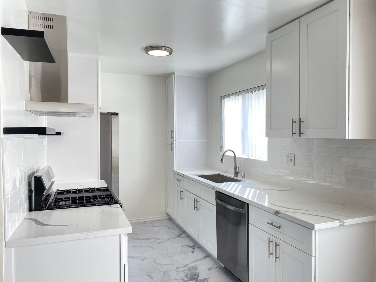 7010 Lanewood Ave LLC - Photo 2 of 34