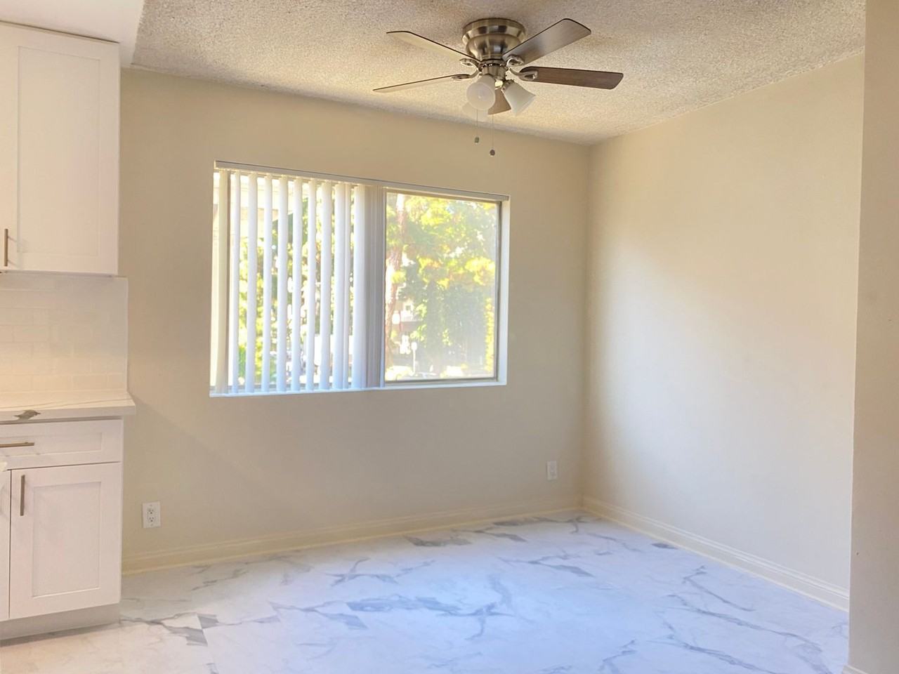 7010 Lanewood Ave LLC - Photo 6 of 34