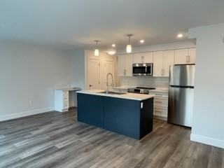 210 First Ave W #104 - Photo 2 of 24