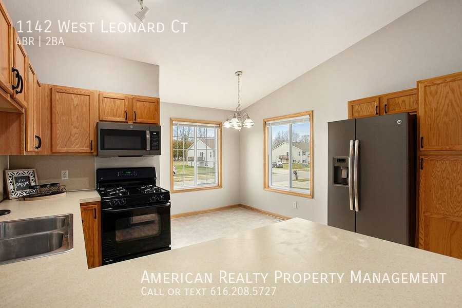 1142 W Leonard Ct Nw - Photo 2 of 19