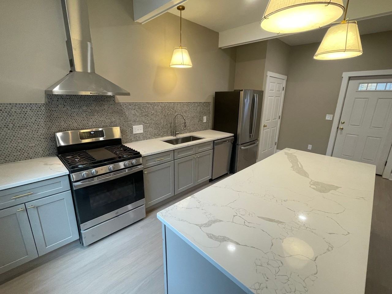 209-217 209-217 E Seneca Street - 215- Library - Photo 2 of 13