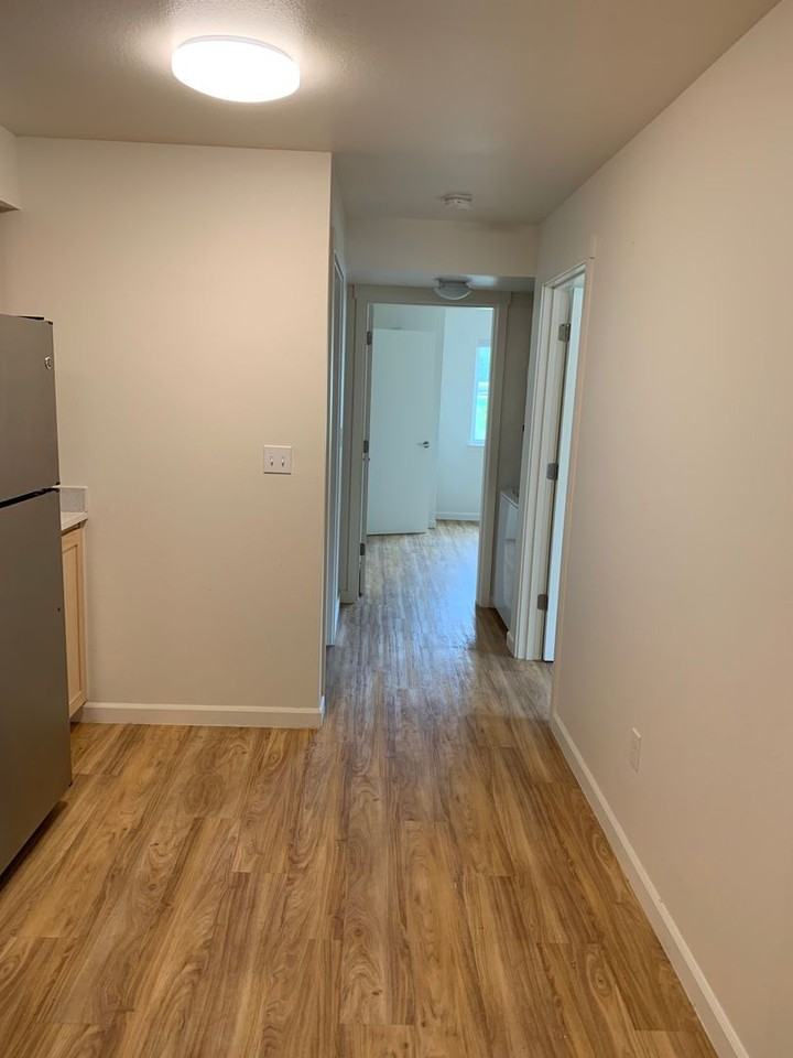 Pacific Rim Apartments - Photo 3 of 7