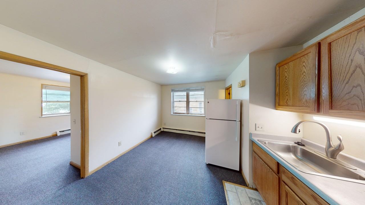 Gilman 115 East - Photo 3 of 24