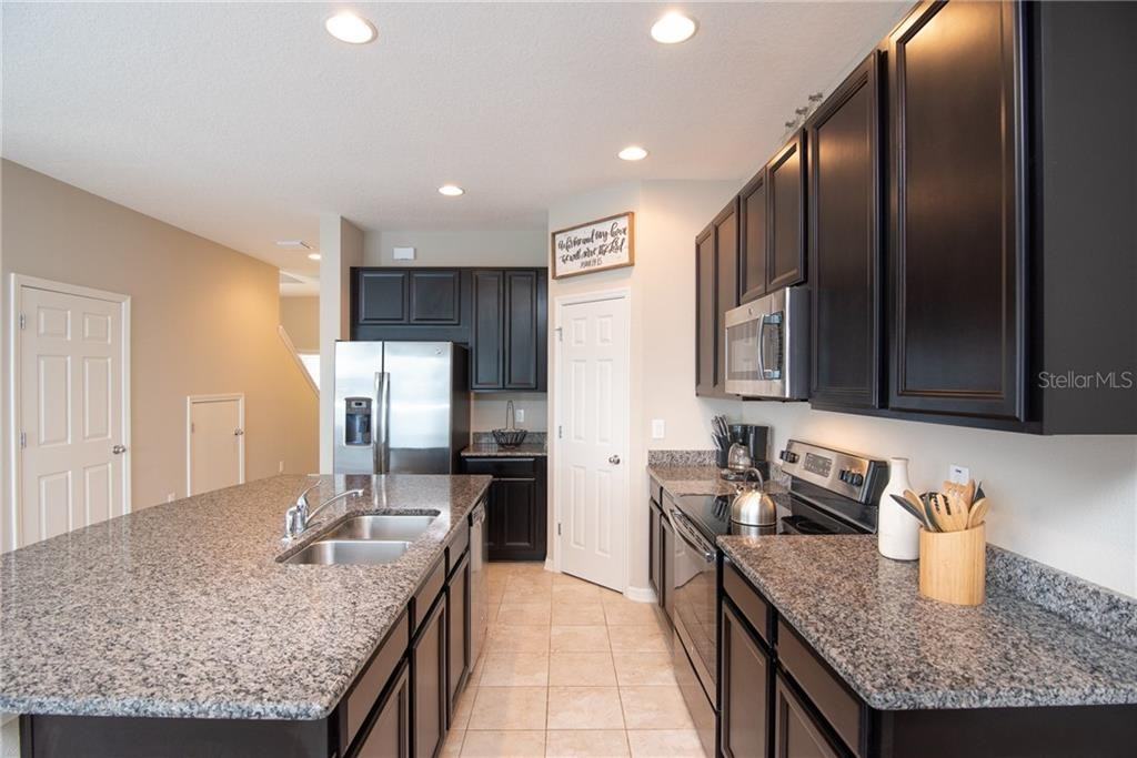 7083 Woodchase Glen Dr - Photo 4 of 26