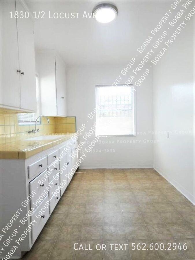 1830 1/2 Locust Ave - Photo 2 of 9