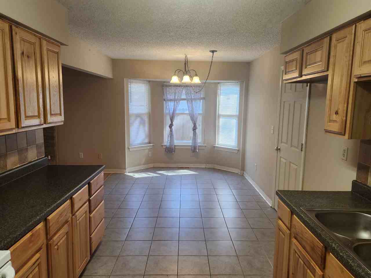 21541 E 32nd St S - Photo 2 of 14