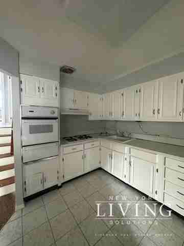 1205 E 68th St - Photo 2 of 9