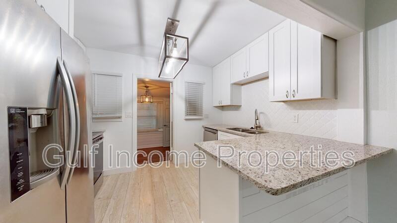 214 15th Ave W - Photo 7 of 31