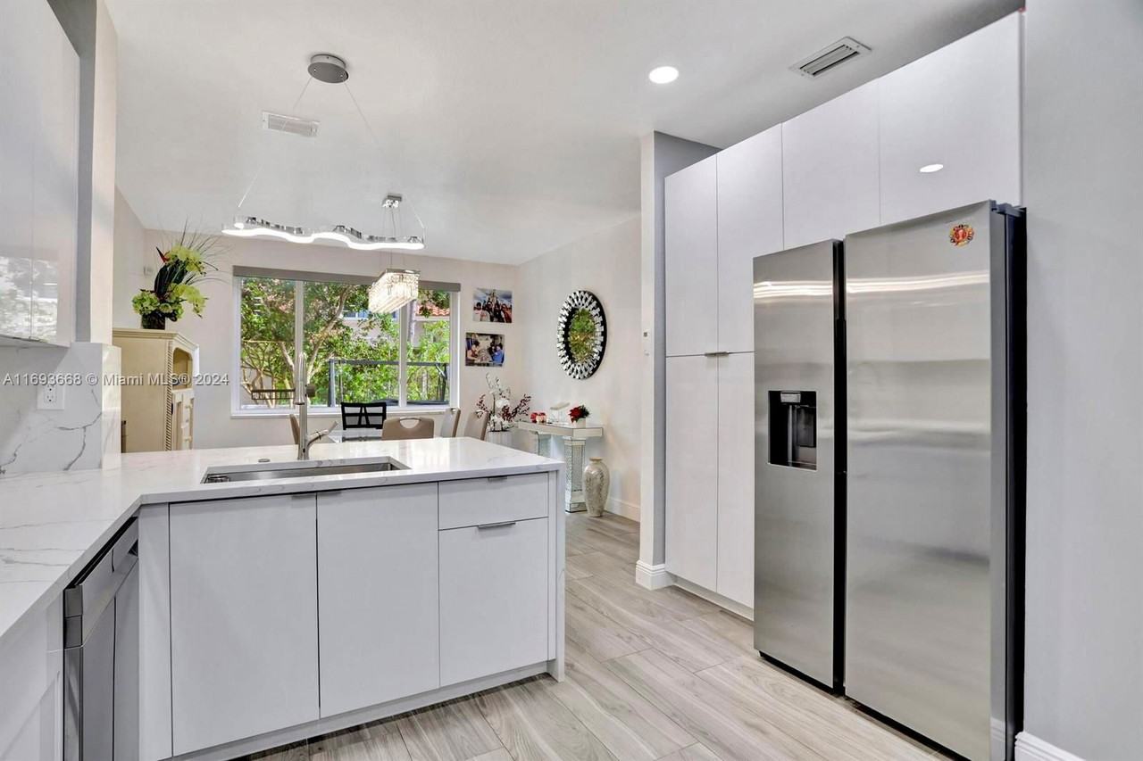 12673 Nw 56th St - Photo 3 of 8
