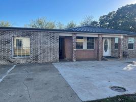 featured image of 103 W 1st St