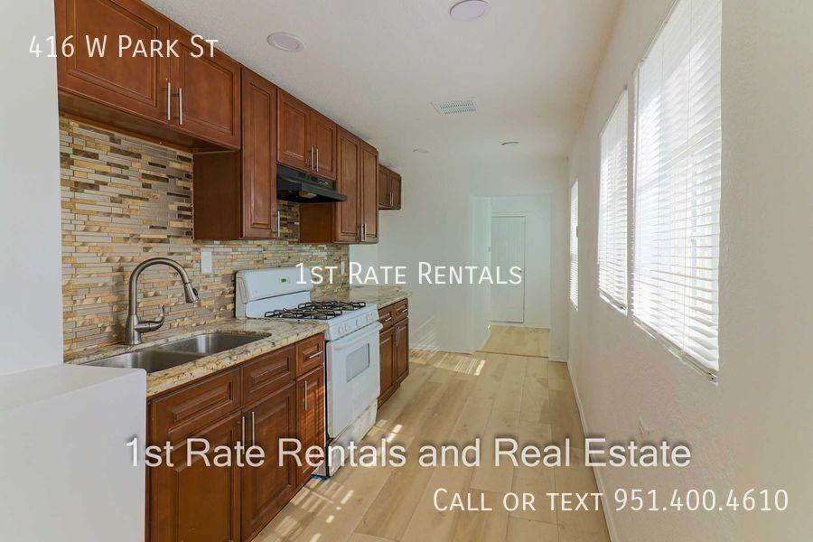 416 W Park St - Photo 4 of 11