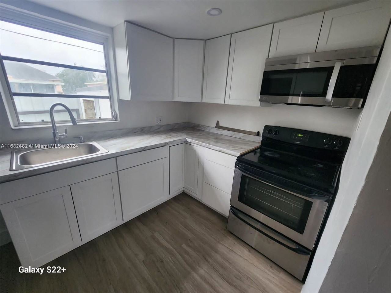 1076 Nw 74th St - Photo 2 of 7