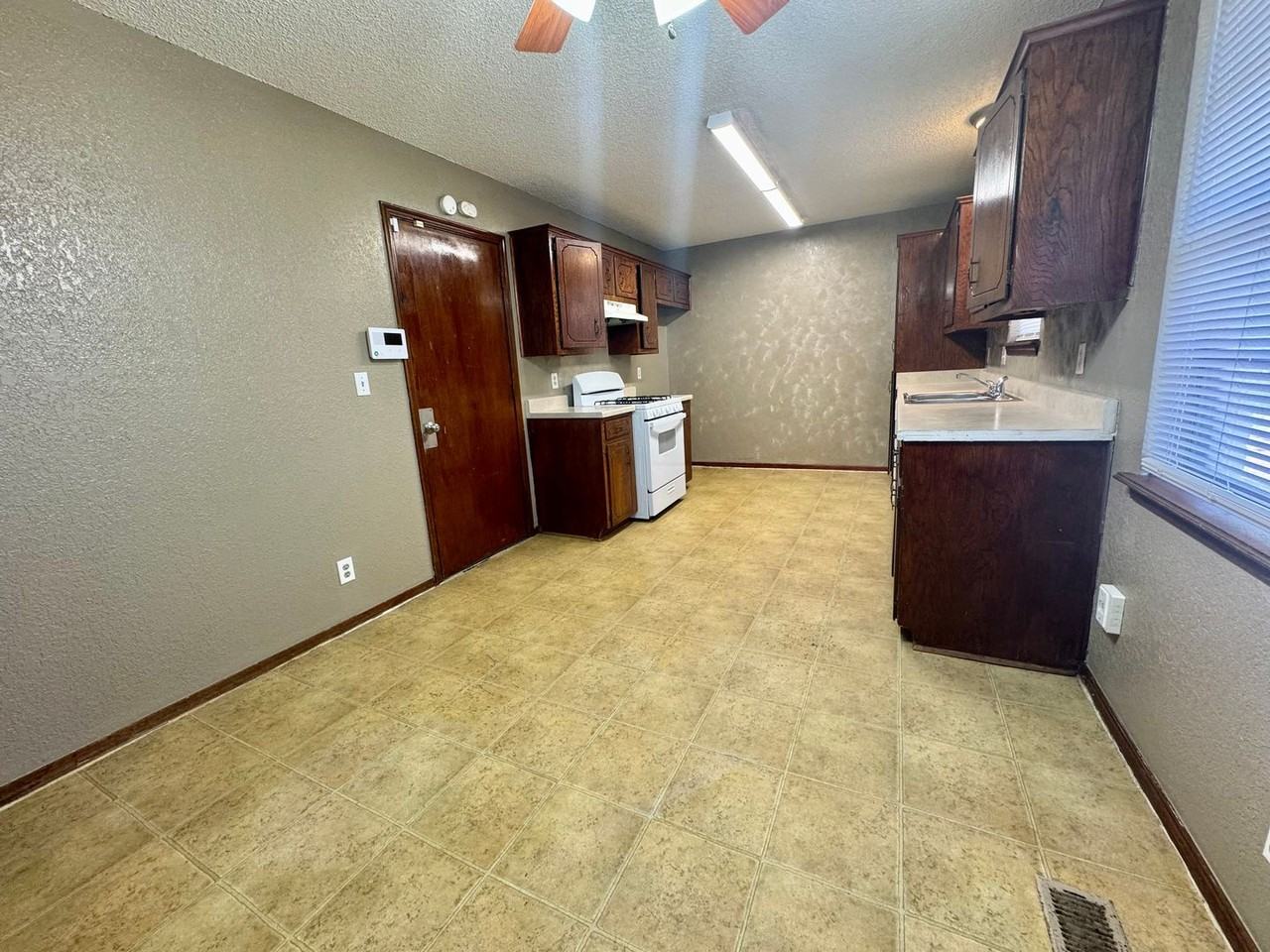 1403 S 121st East Ave - Photo 5 of 19