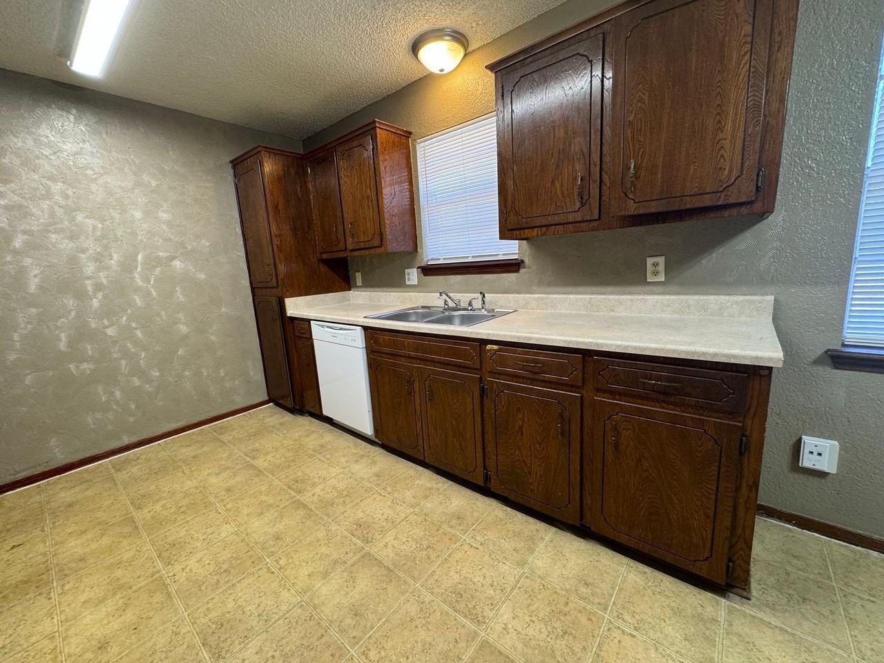 1403 S 121st East Ave - Photo 6 of 19