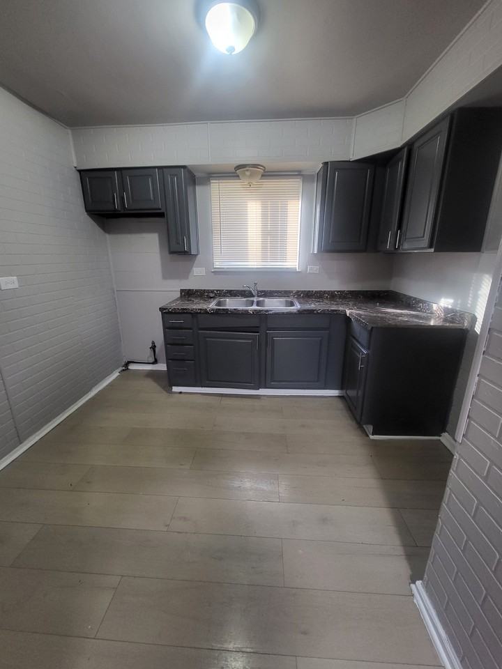 1007 W 104th Pl #NA - Photo 2 of 9