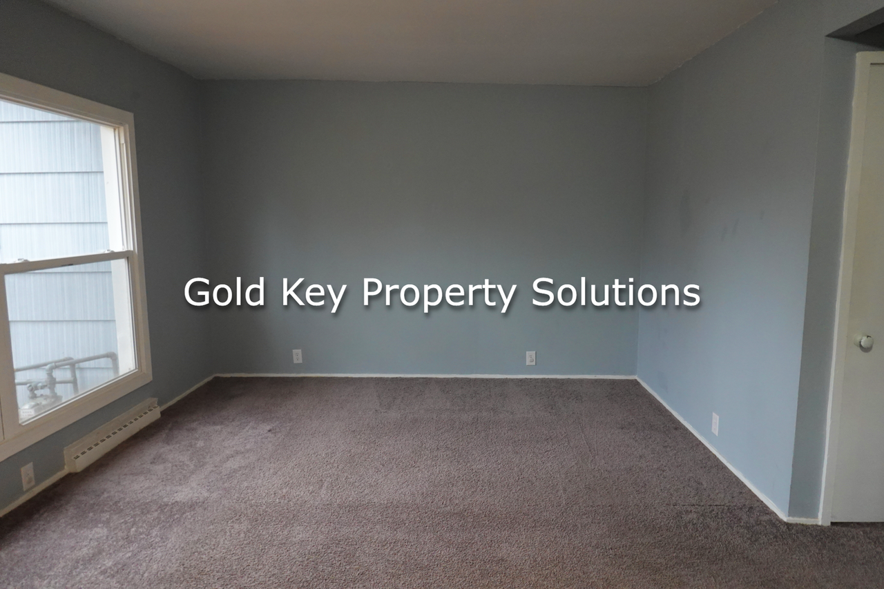 1207-1209 E 11th St - Photo 2 of 24