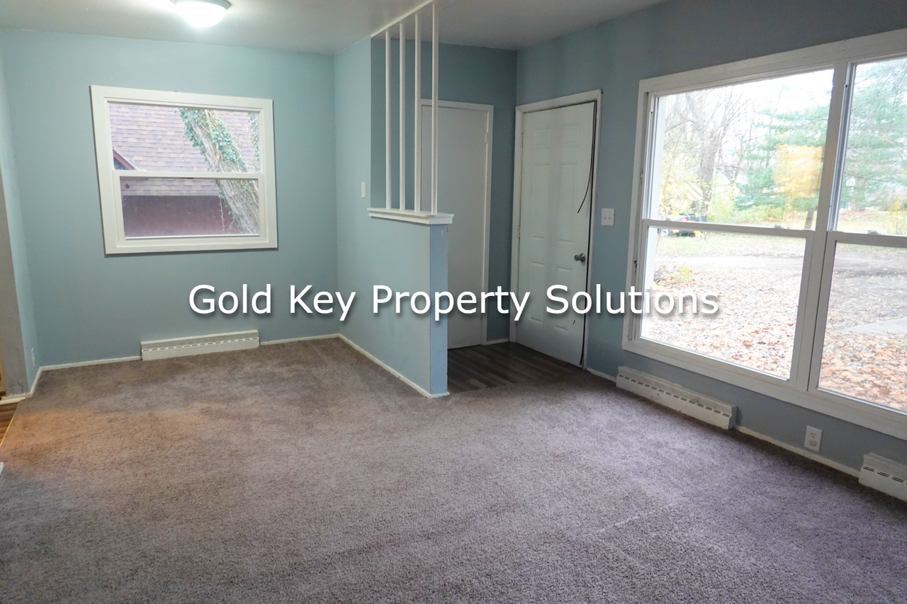 1207-1209 E 11th St - Photo 3 of 24