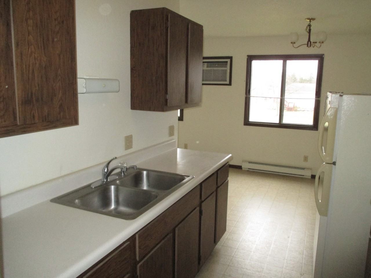 Village Green Apartments - Holloway - Photo 3 of 11