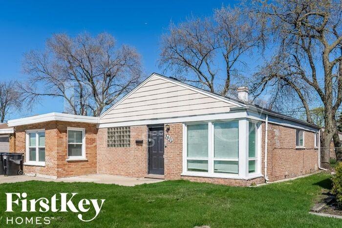 8401 S Kenton Ave - Photo 2 of 15