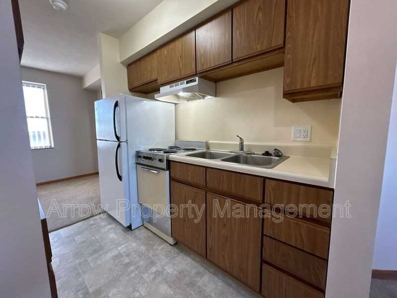 208 E 5th St - Photo 2 of 10