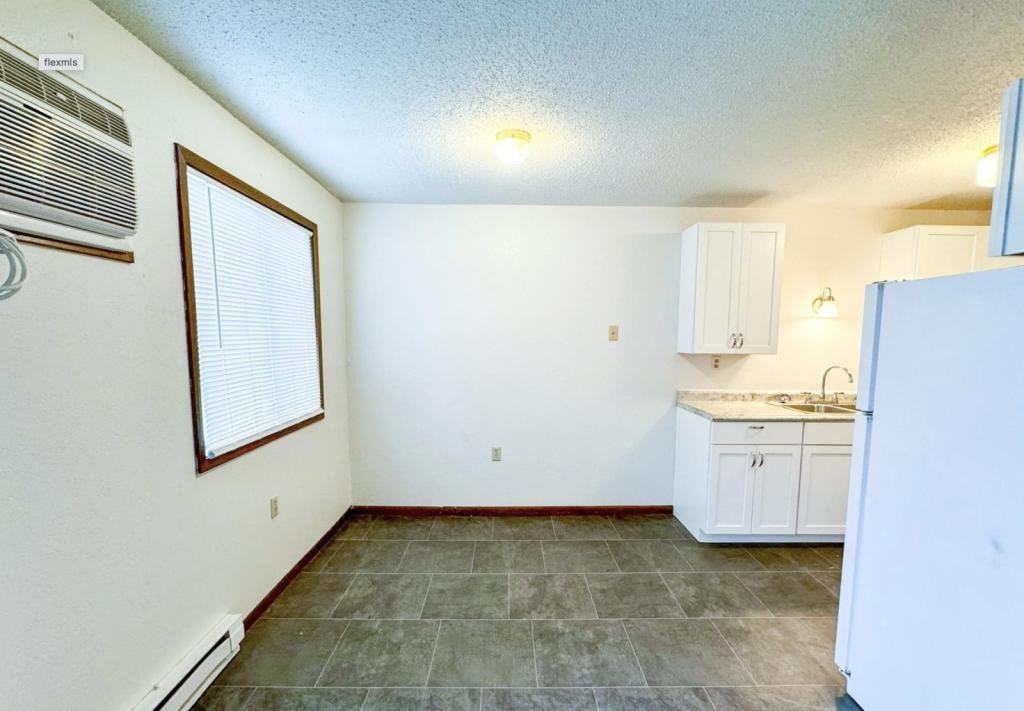 209 5th St E - Photo 5 of 11